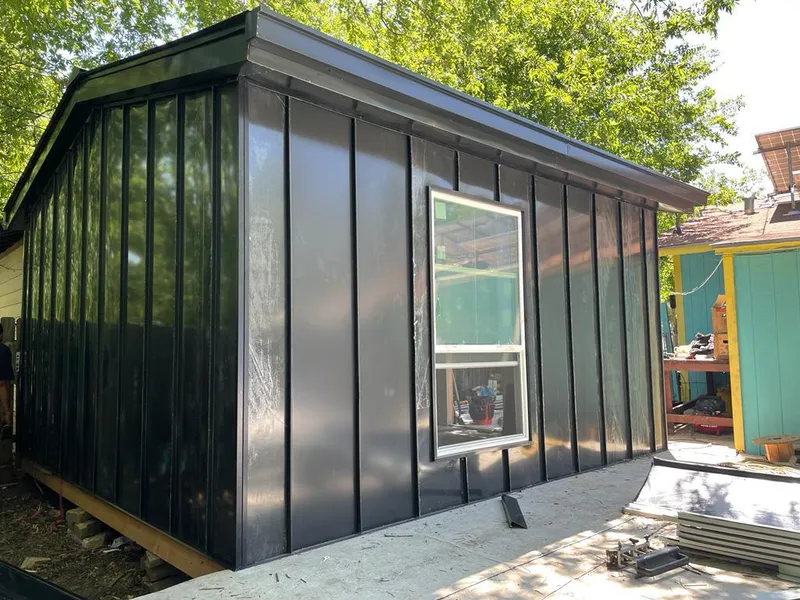 Black standing seam metal wall panels for Metal Roof Installation in Tewksbury